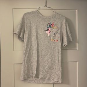 used grey hurley womens pocket tshirt (xl but runs small)